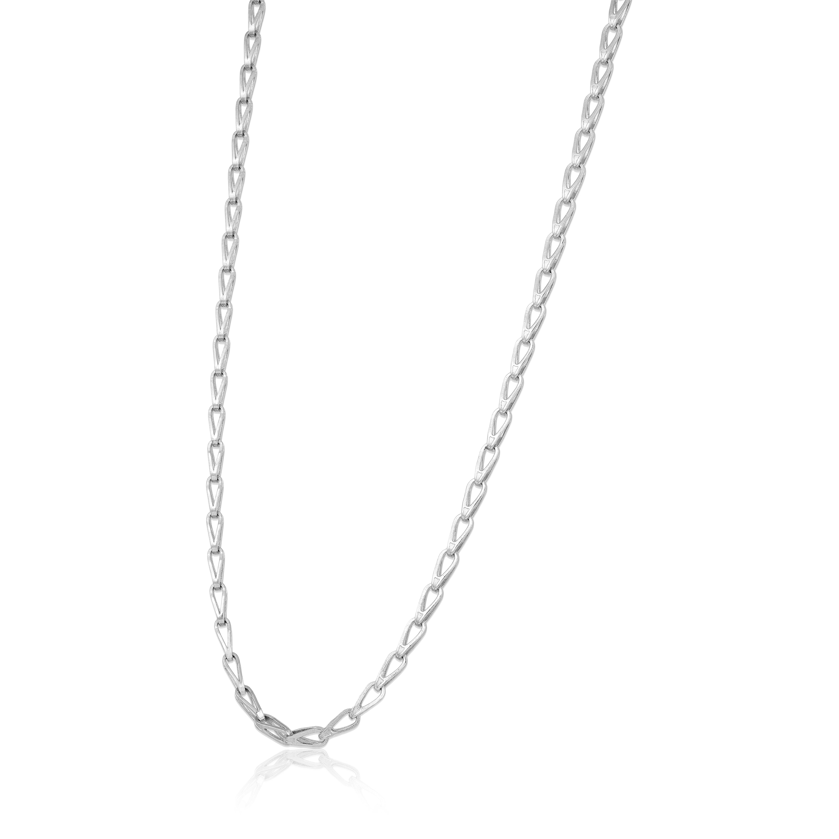 Silver chain necklace on a white background
