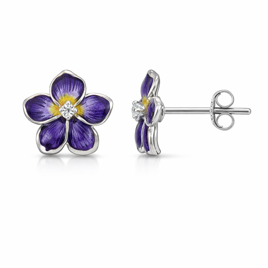 Purple flower-shaped earrings with a central gemstone on a white background