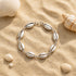 Seaside Cowrie Shell Silver Elegant Linked Charm Bracelet