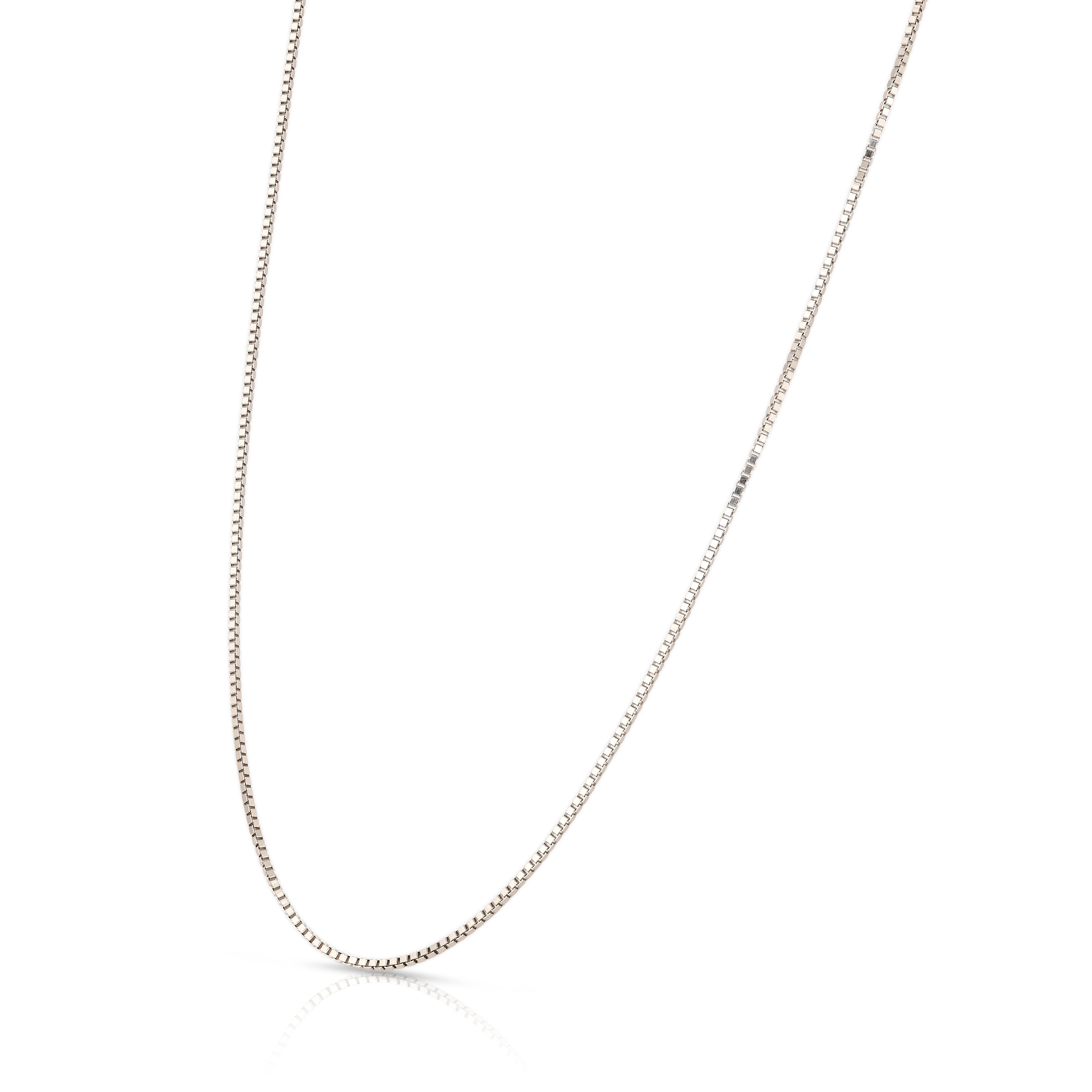 Silver chain necklace on a white background