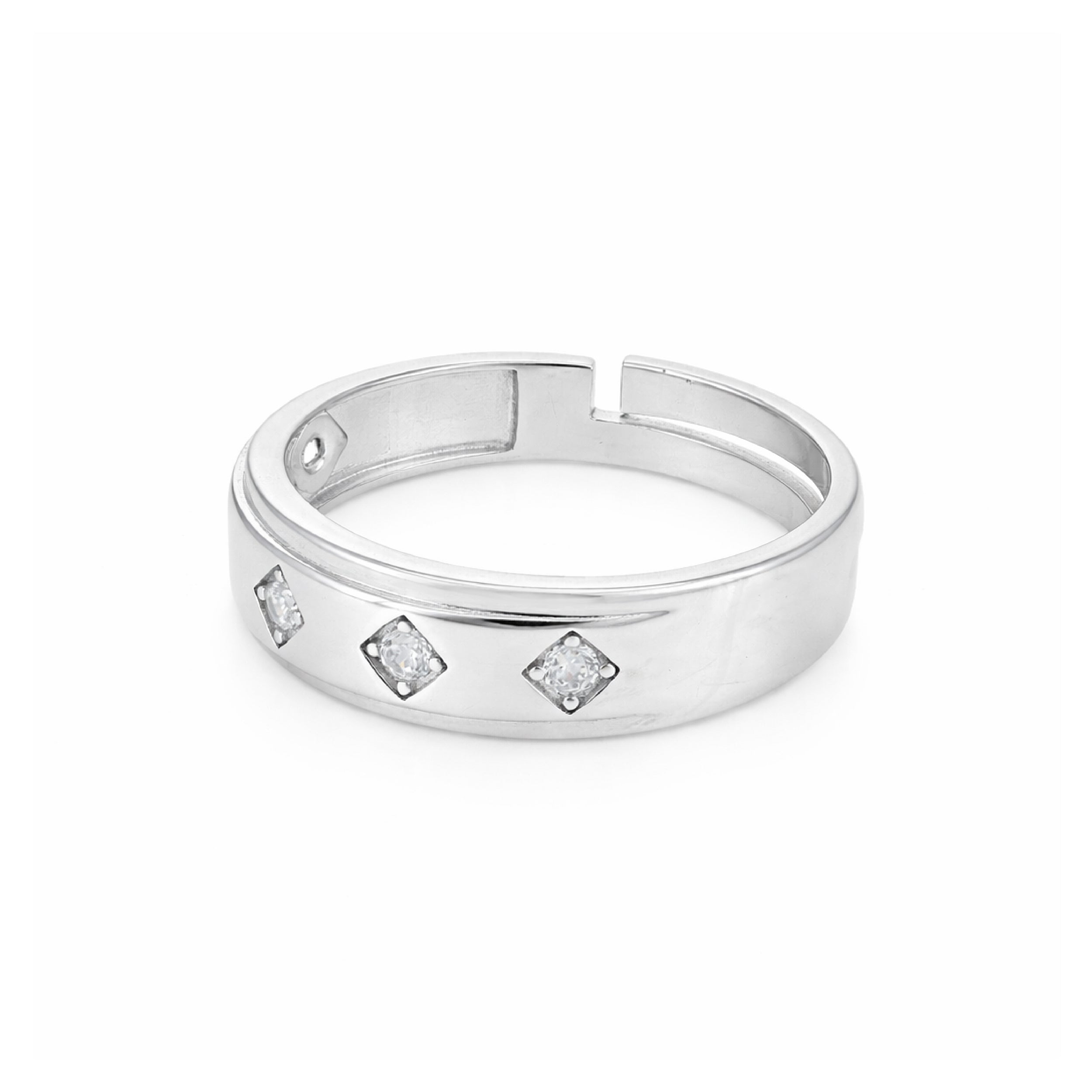 Silver ring with embedded diamonds on a white background