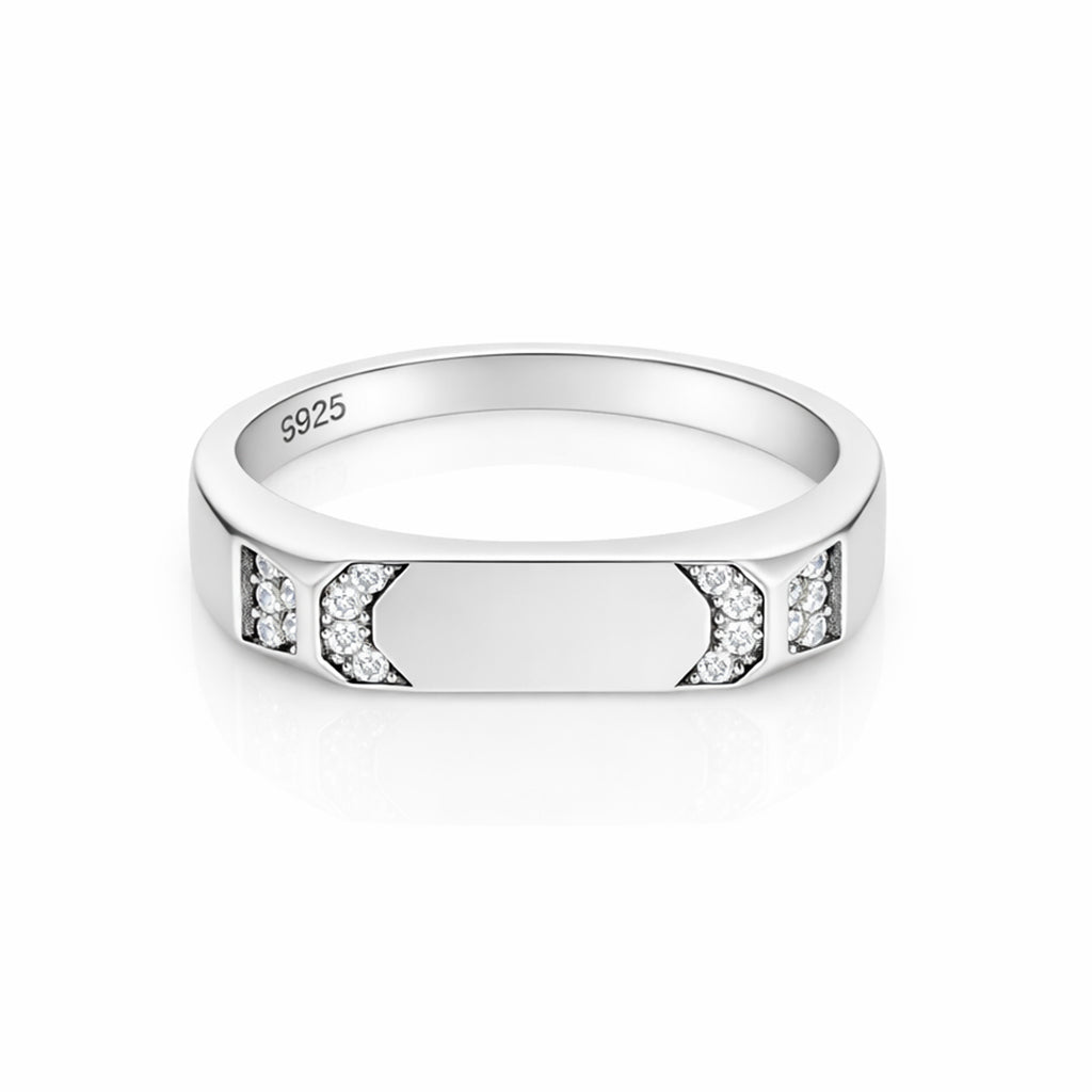 Silver ring with embedded diamonds on a white background
