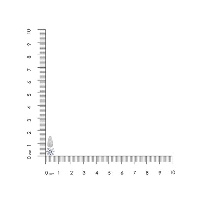 Small diamond next to a ruler for scale on a white background