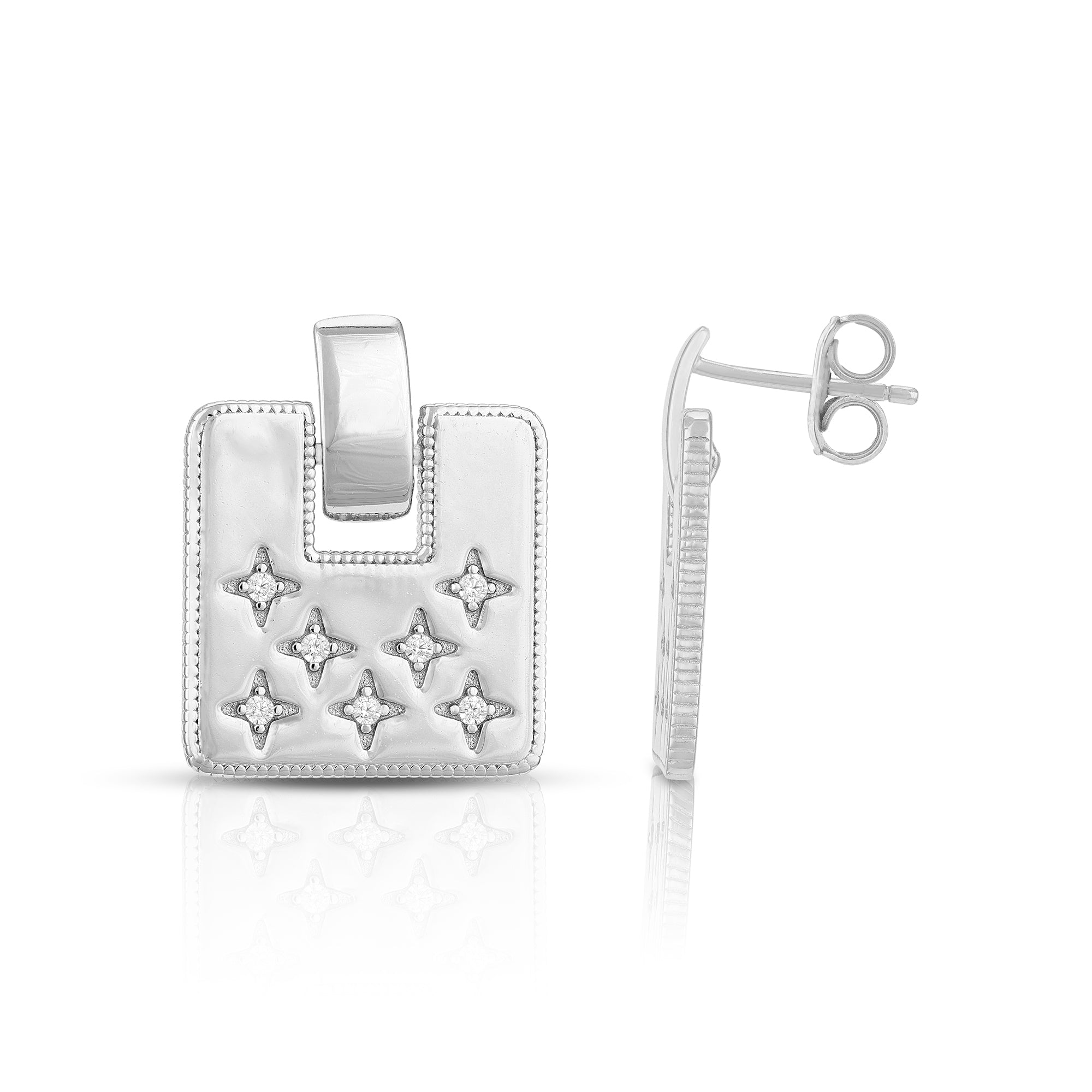 Silver star-shaped earring on a white background