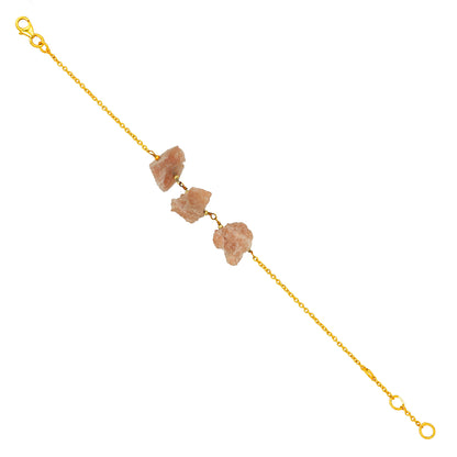 Gold bracelet with natural stone pendants on a white background
