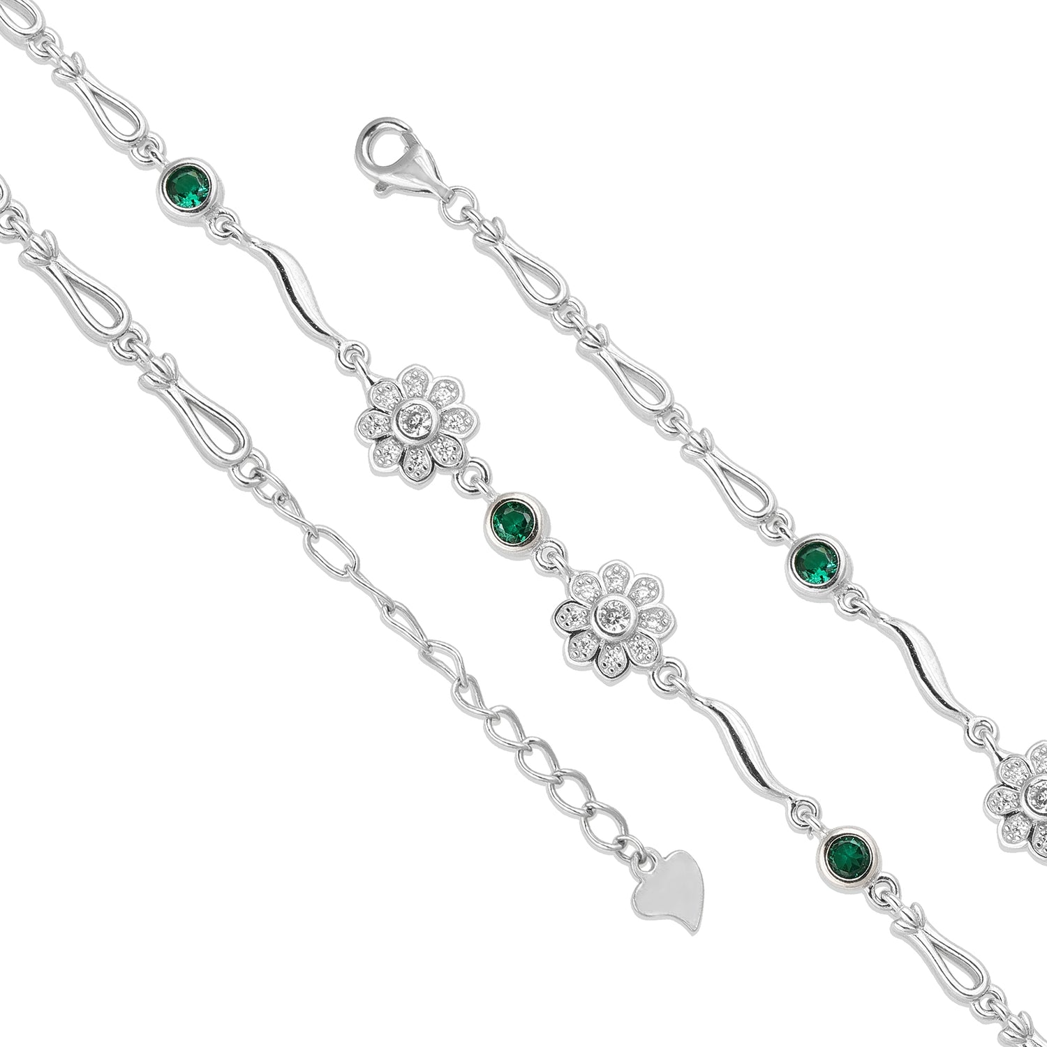 Silver bracelet with green gemstones and floral designs on a white background