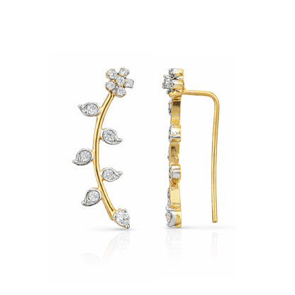 Gold earrings with diamond accents on a white background