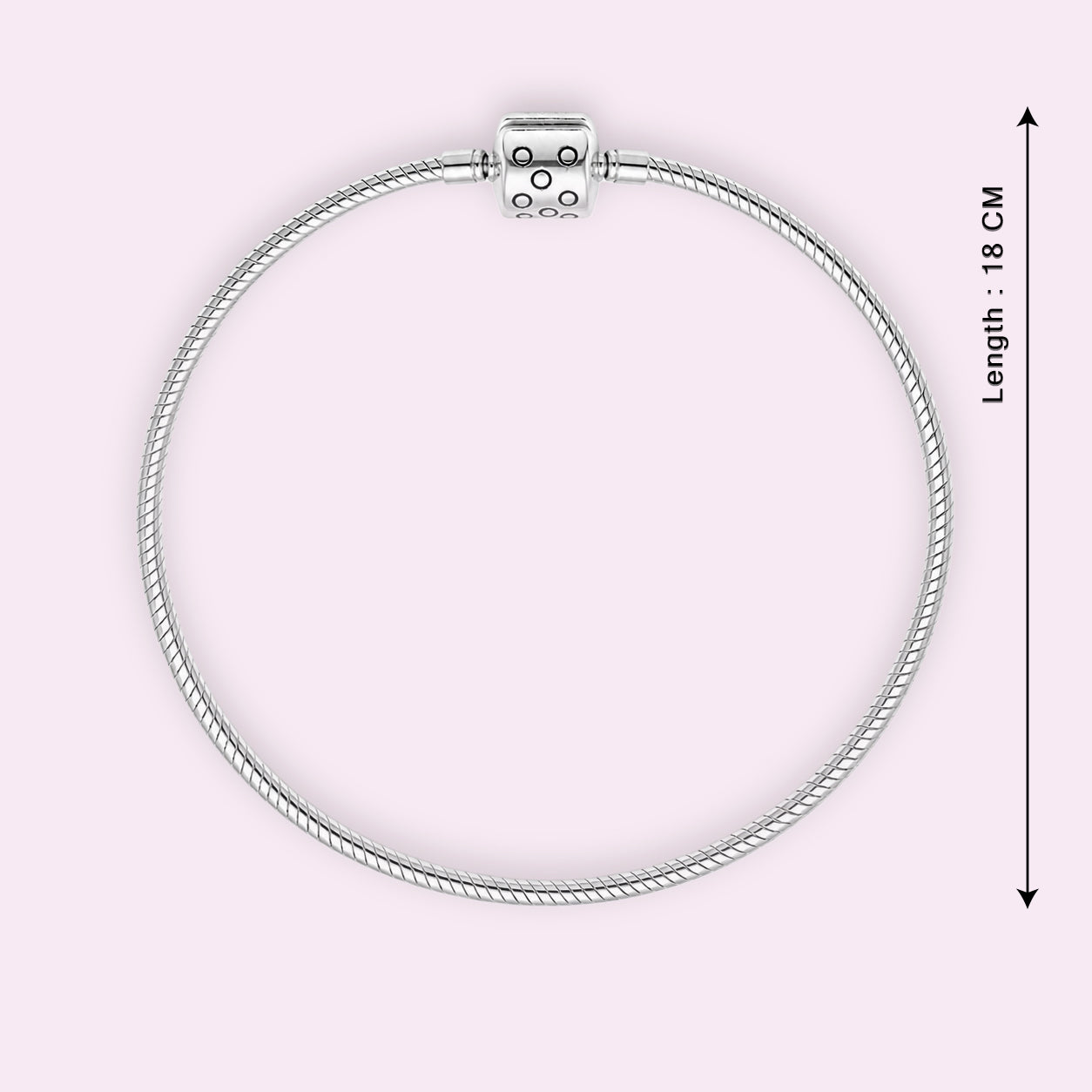 Silver bracelet with a clasp on a light pink background