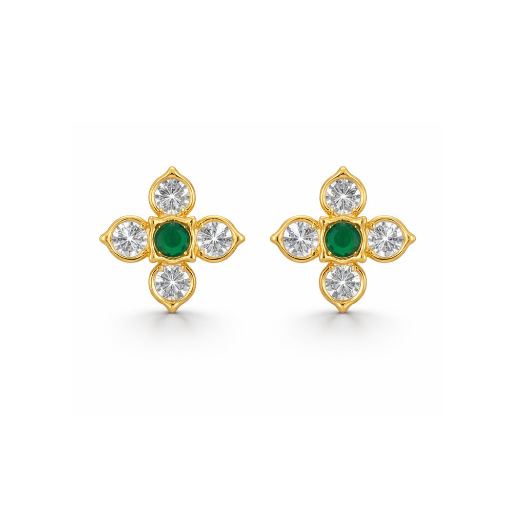 Gold earrings with green gemstones and clear stones on a white background
