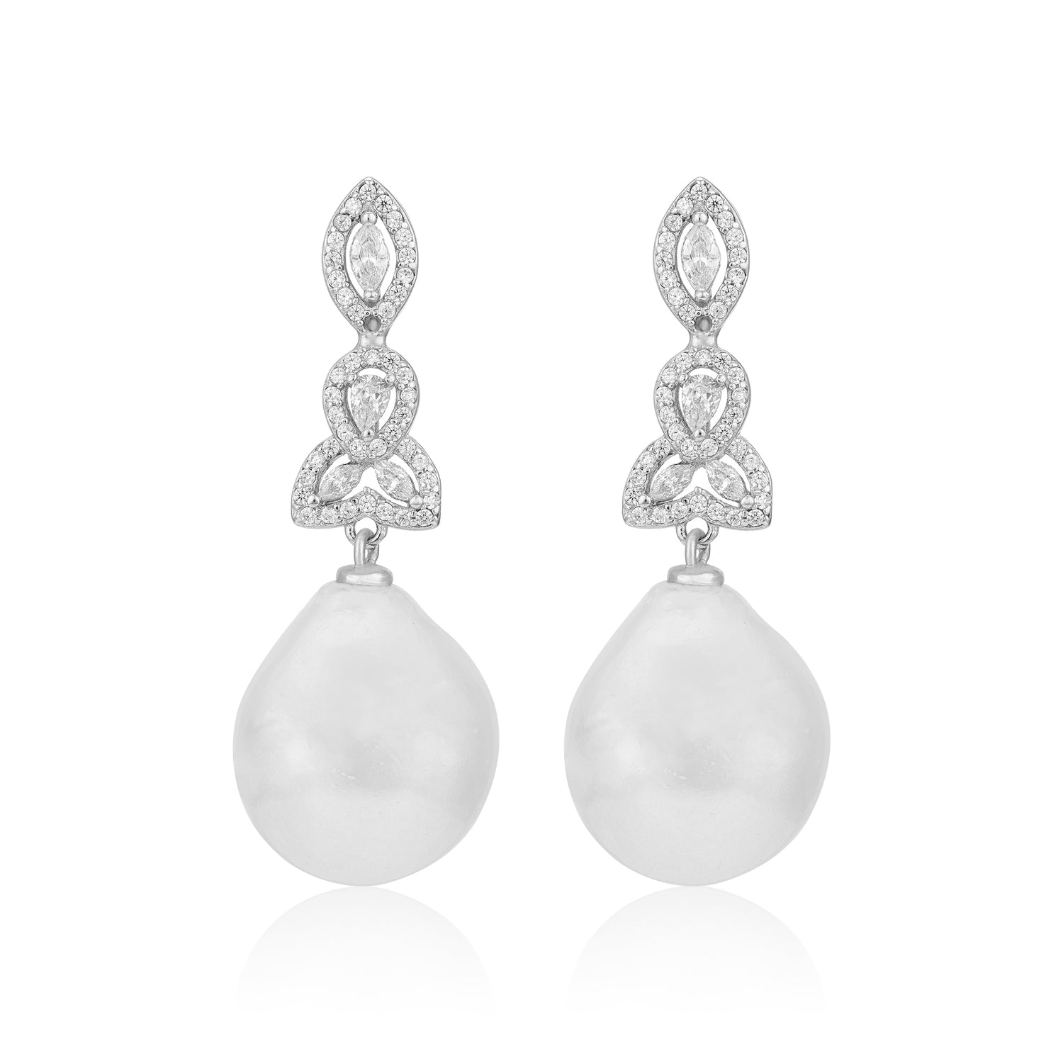 Pair of earrings with teardrop-shaped pearls and diamond-like stones on a white background