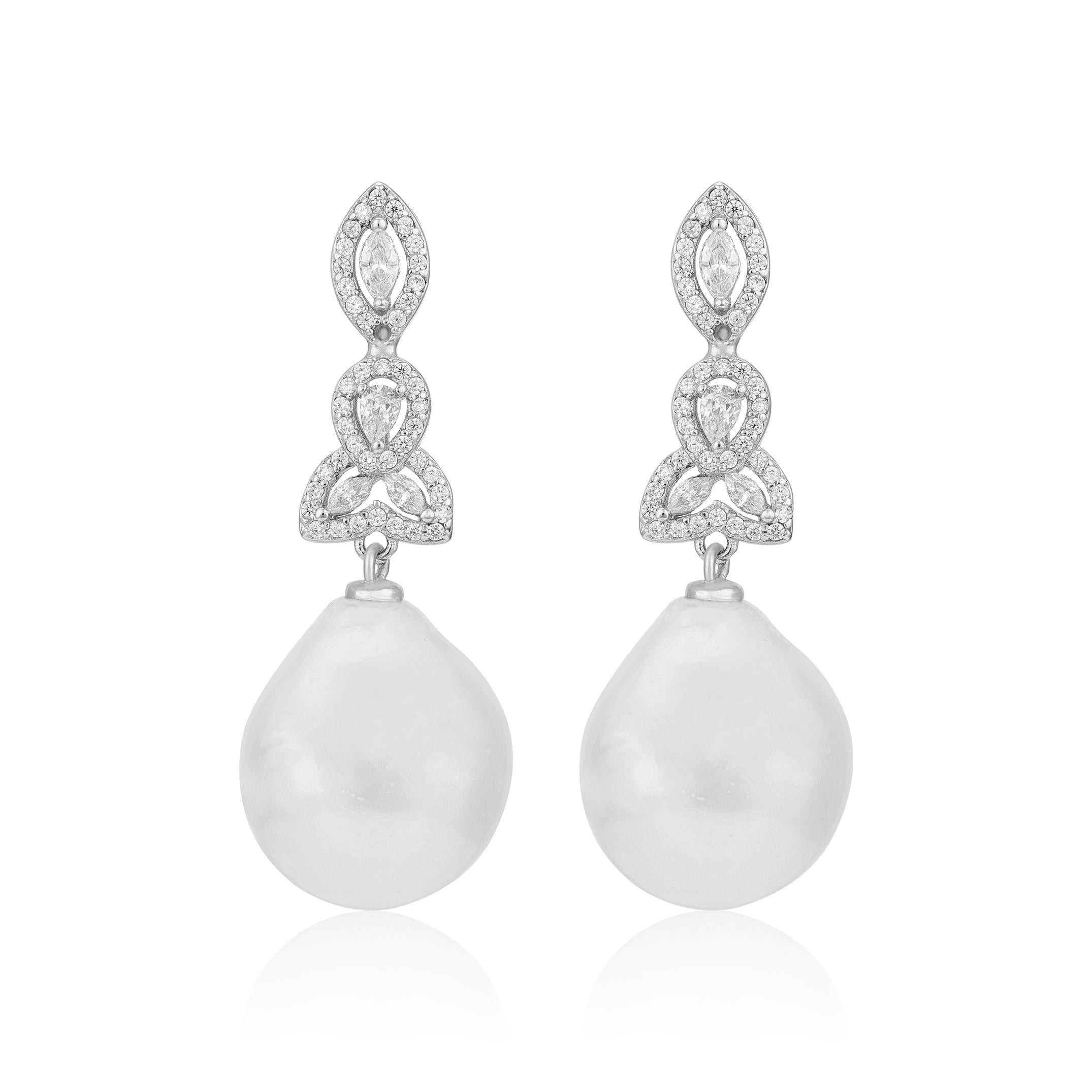 Pair of earrings with teardrop-shaped pearls and diamond-like stones on a white background